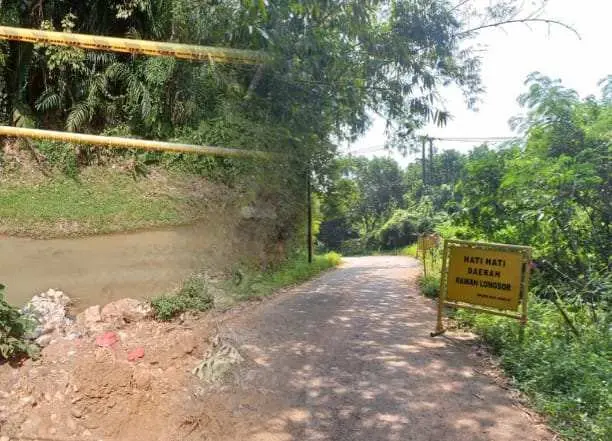 Longsor Rusak Jalan dan TPT di Curug Jasinga, Warga Khawatir Bahaya Susulan