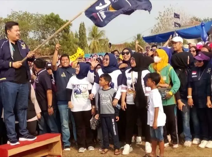 HUT Partai Nasdem Ke-12, Ribuan Masyarakat Hadiri Jalan Sehat Di Tegineneng