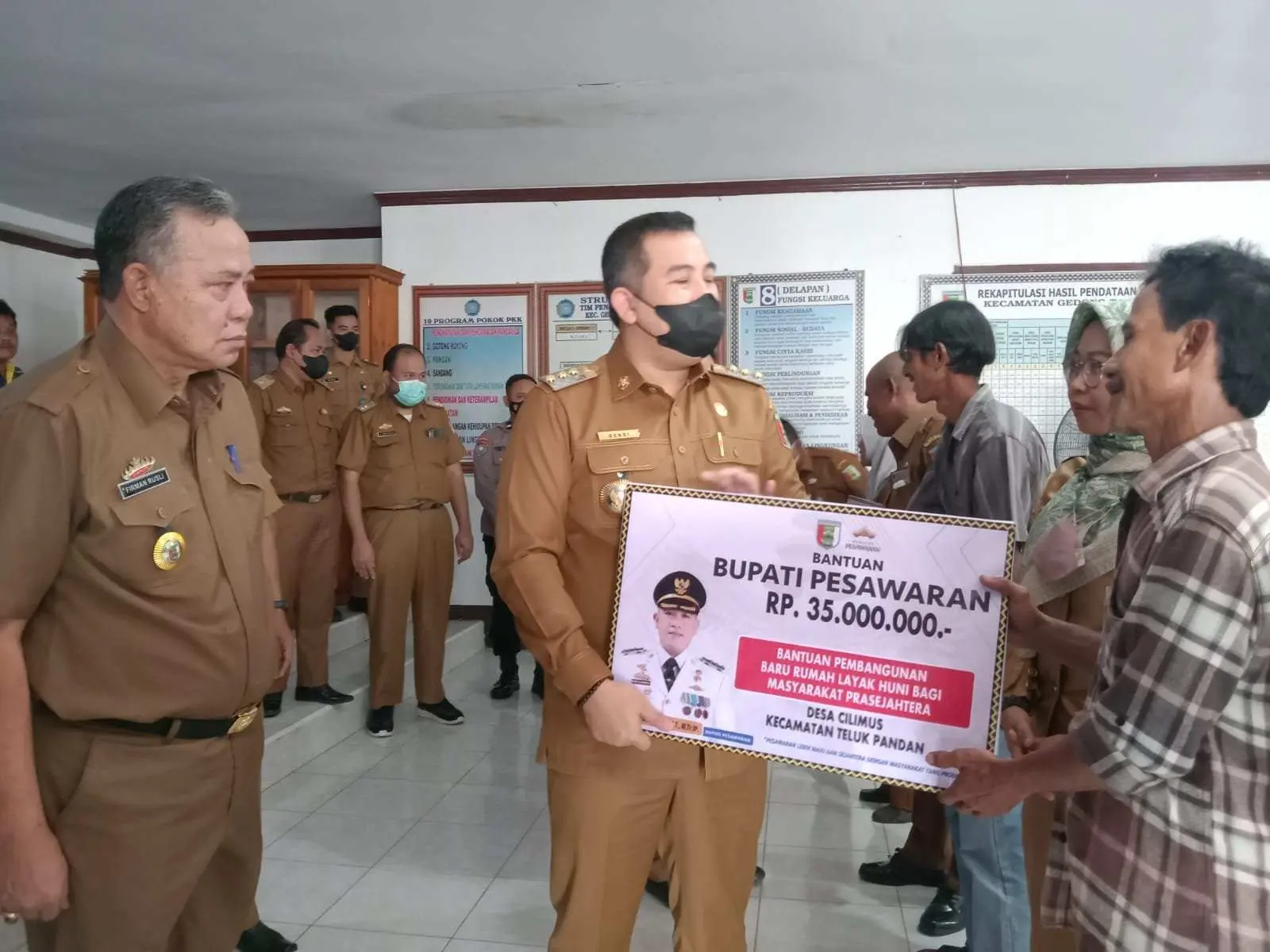Dinas PRKP  Serahkan Bantuan RLH Secara Simbolis